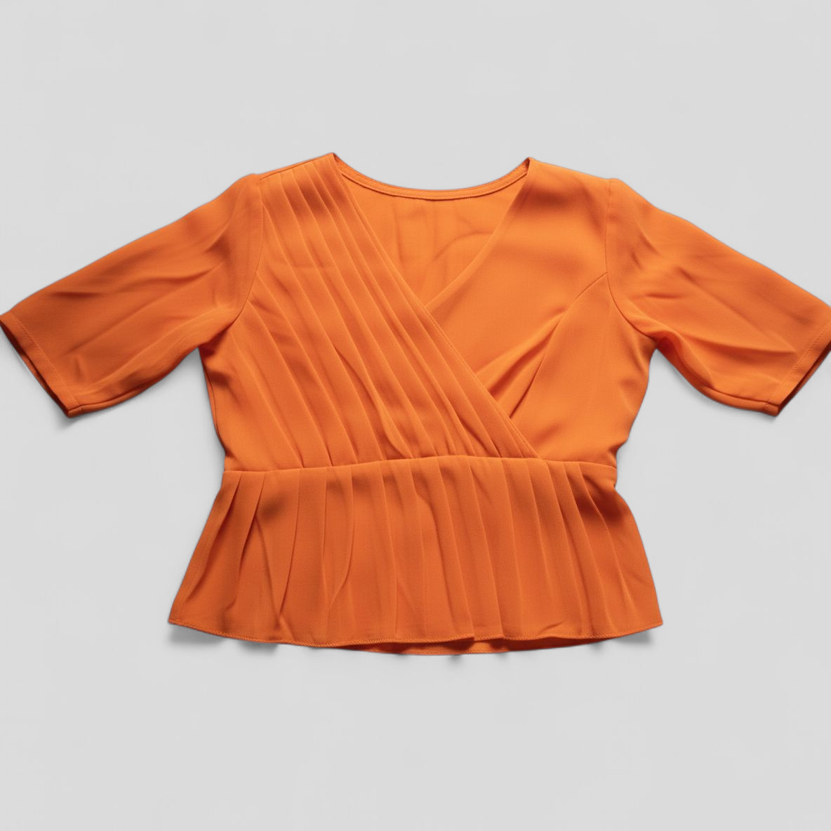 Pleated Wrap Peplum Top