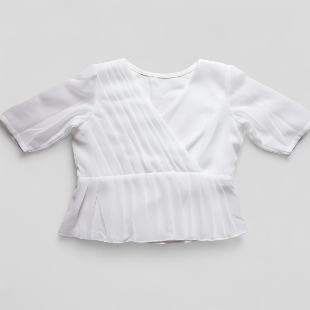 Pleated Wrap Peplum Top