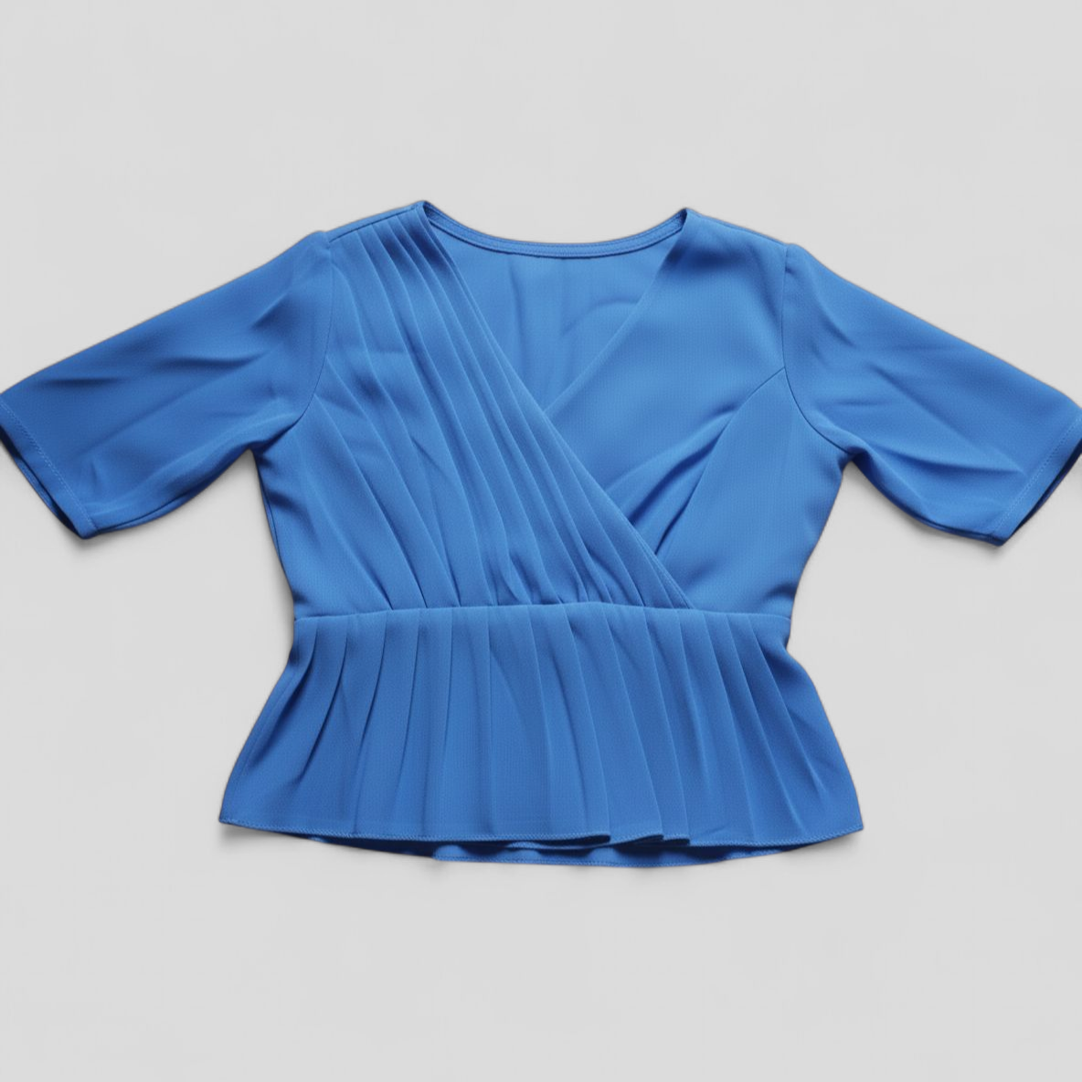 Pleated Wrap Peplum Top