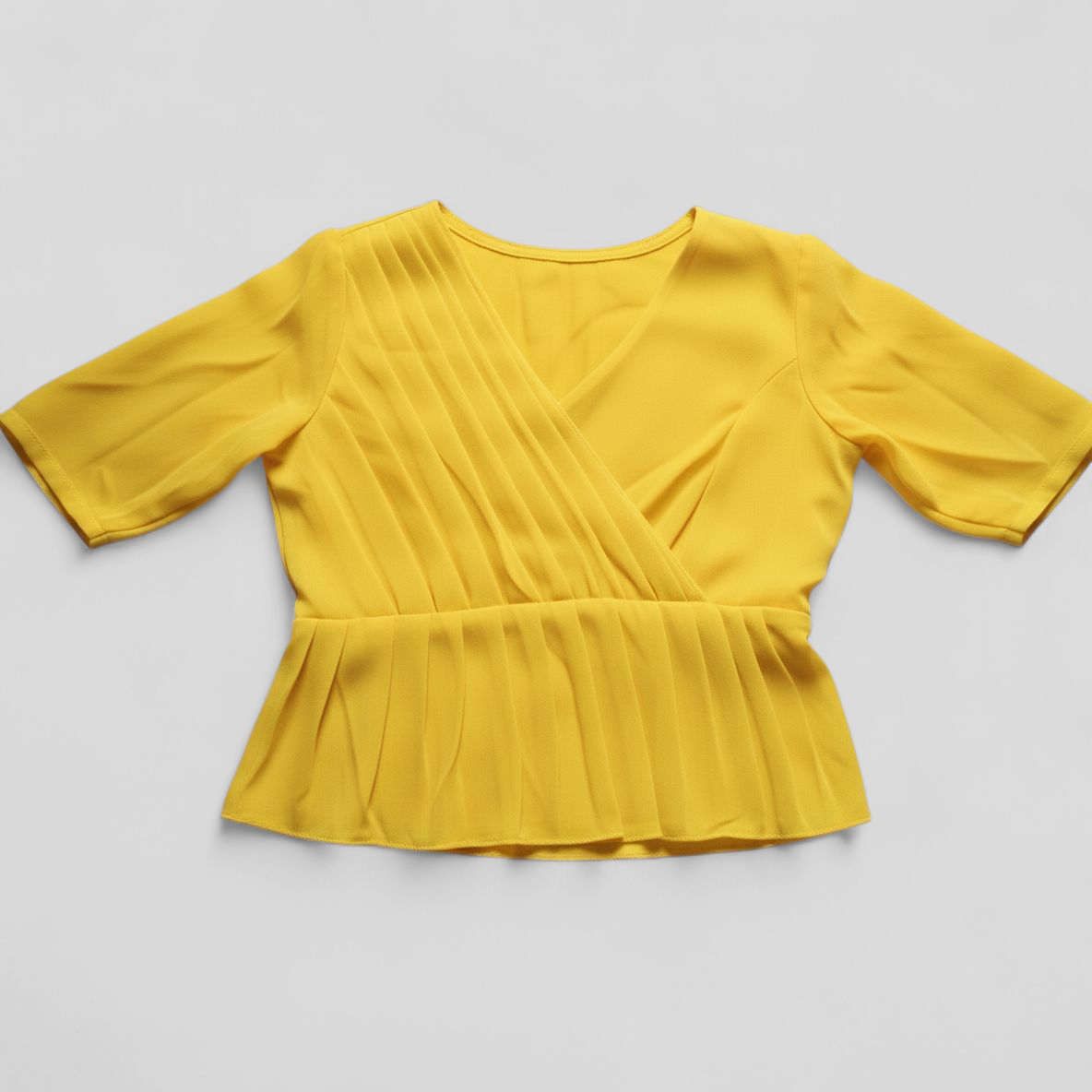 Pleated Wrap Peplum Top